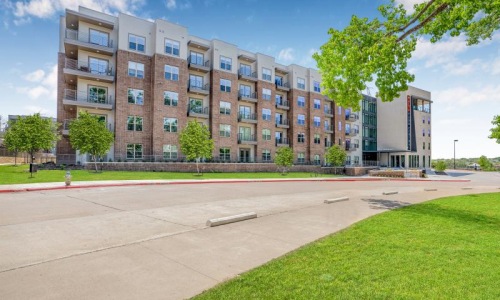 a building with a lawn in front